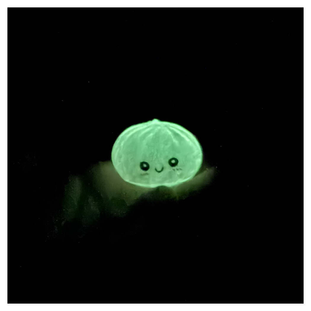 Mały Pierożek Świecący w Ciemności - Fluorescencyjny Gniotek Squishy Dumpling Zabawka Sensoryczna